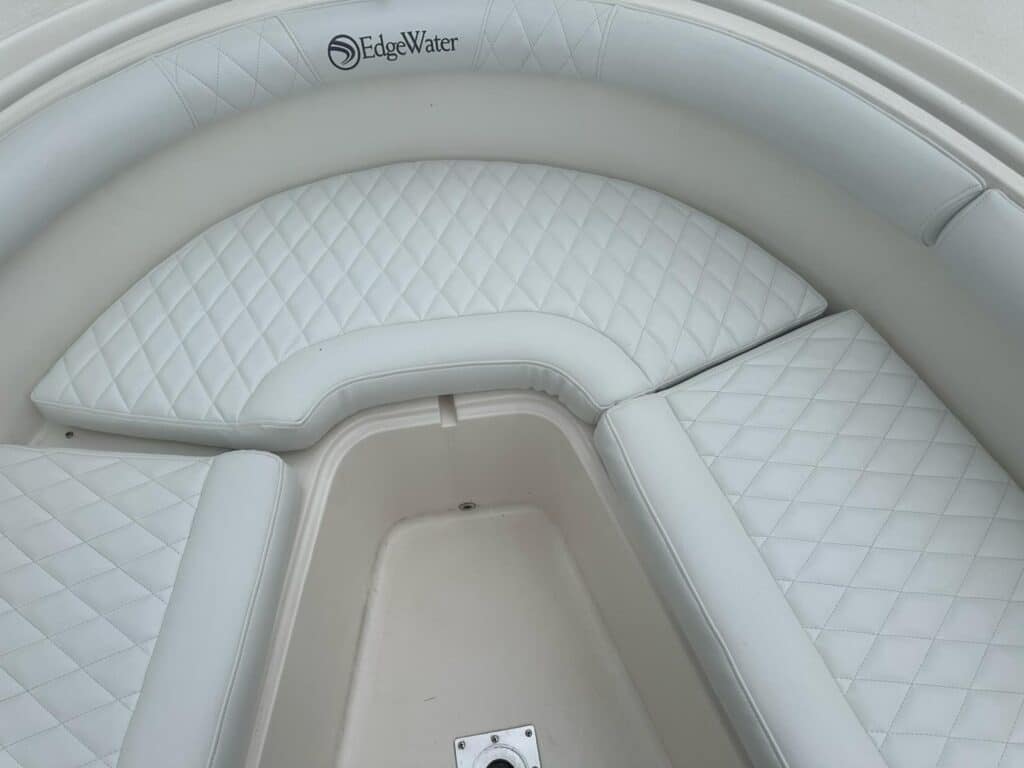 White quilted boat seating area